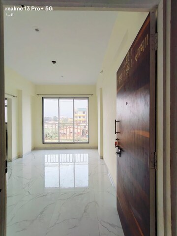 Living Room in 1 BHK Apartment at Vardhaman Vatika Navi Mumbai, Shelu – for Sale