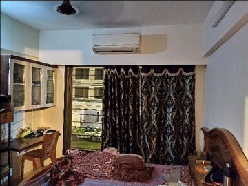 Living Room in 1 BHK Apartment at Shree Krishna Eastern Winds, Kurla East – for Rent