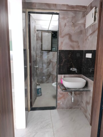 Bathroom in 2 BHK Apartment at Bhaktamar Residency, Wadgaon Sheri – for Rent