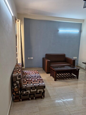 Living Room in 1 RK Apartment at Ansal Sushant Lok I, Sector 43 – for Rent