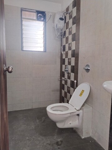 Bathroom in 2 BHK Apartment at Galaxy Green Woods, Kharghar – for Sale