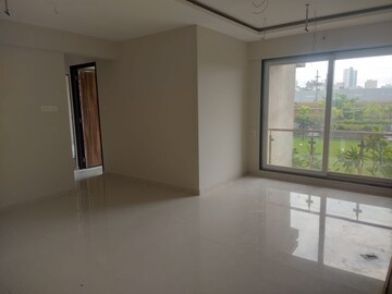 Living Room in 2 BHK Apartment at Galaxy Green Woods, Kharghar – for Sale