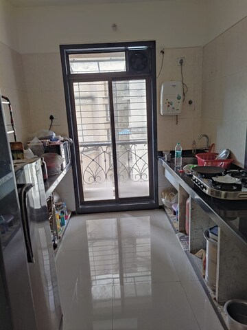 Kitchen in 2 BHK Apartment at Nisarg Hyde Park, Kharghar – for Sale