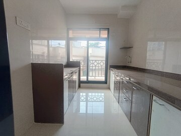 Kitchen in 2 BHK Apartment at Mahalaxmi Ashish, Dombivli East – for Sale