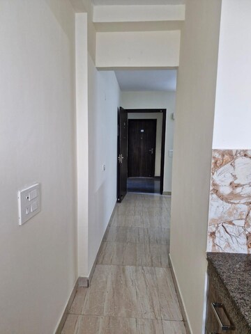 Building Lobby in 1 BHK Apartment at Ansal Sushant Lok I, Sector 43 – for Rent