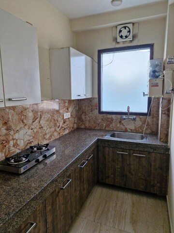 Living Room in 1 BHK Apartment at Ansal Sushant Lok I, Sector 43 – for Rent