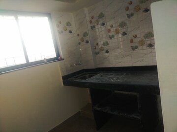 Kitchen in 1 BHK Apartment at Wadgaon Sheri – for Rent