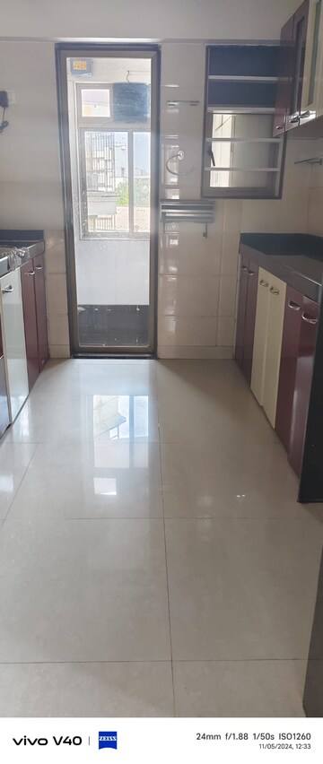 Kitchen in 2 BHK Apartment at Dhaval Sunrise Orlem, Malad West – for Rent