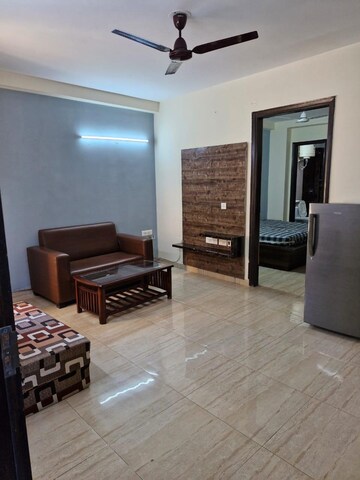 Living Room in 1 BHK Apartment at Ansal Sushant Lok I, Sector 43 – for Rent