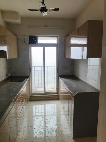 Kitchen in 2 BHK Apartment at Vihang Vermont, Ghodbunder Road – for Rent
