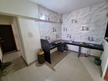 Kitchen in 2 BHK Apartment at Shubhamkaroti Apartment, Chinchwad – for Rent