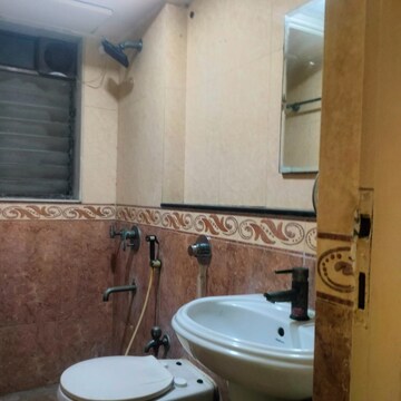 Bathroom in 3 BHK Apartment at Renaissance Tower, Andheri West – for Rent