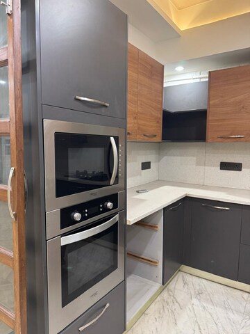 Kitchen in 4 BHK Builder Floor at New Friends Colony – for Rent