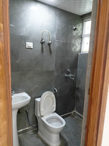 Bathroom in 3 BHK Builder Floor at Ambesten Twin Corsage, Sector 1 Greater Noida – for Sale