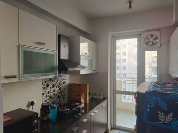 Kitchen in 3 BHK Apartment at Prateek Wisteria, Sector 77 – for Sale