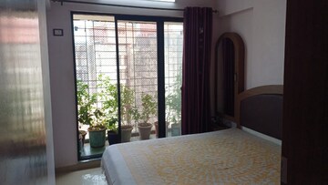 Bedroom in 2.5 BHK Apartment at Mulund East – for Sale
