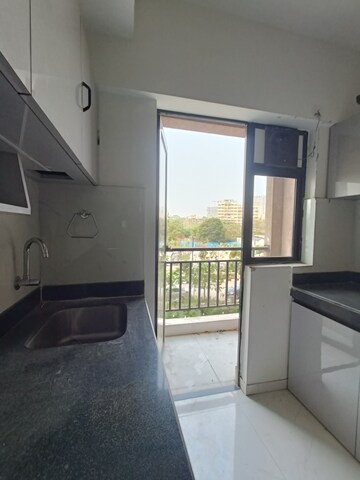Kitchen in 3 BHK Apartment at Runwal Gardens, Dombivli East – for Rent