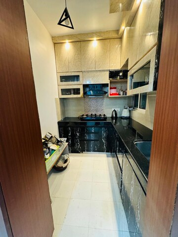 Kitchen in 2.5 BHK Apartment at Experion Capital, Gomti Nagar – for Rent