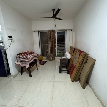 Living Room in 1 BHK Apartment at Shraddha Vertica, Tagore Nagar – for Rent