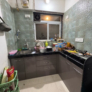 Kitchen in 1 BHK Apartment at Shraddha Vertica, Tagore Nagar – for Rent