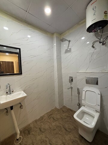 Bathroom in 1 RK Builder Floor at Ansal Sushant Lok I, Sector 43 – for Rent