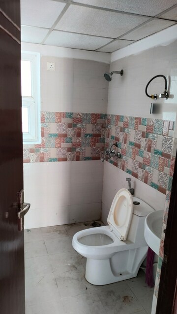 Bathroom in 2 BHK Apartment at AFOWO Raksha Addela, Sector 16c Greater Noida – for Sale