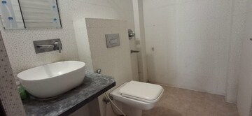 Bathroom in 3 BHK Apartment at Paradigm Business Hermitage Park, Dhakoli Village – for Rent
