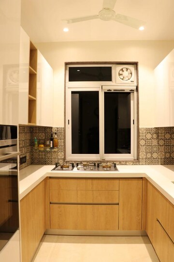 Kitchen in 2 BHK Apartment at Soham Crystal Spires, Ghodbunder Road – for Rent
