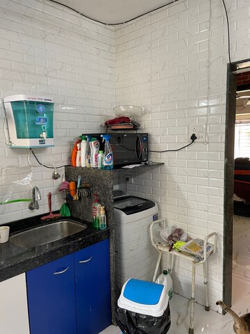 Kitchen in 2 BHK Apartment at Takshila CHS, Andheri East – for Rent