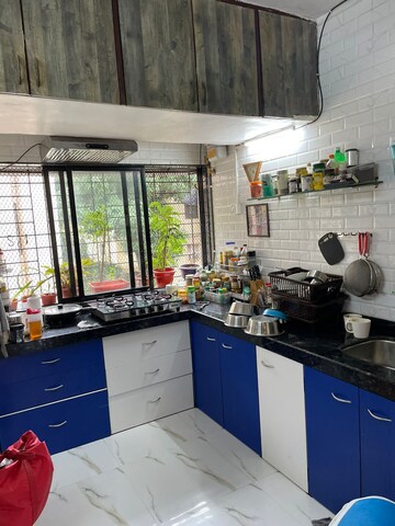 Kitchen in 2 BHK Apartment at Takshila CHS, Andheri East – for Rent