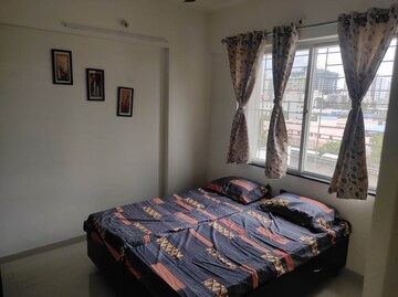 Bedroom in 2 BHK Apartment at Jhamtani Vision Ace Phase 1, Tathawade – for Rent
