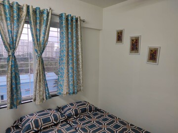 Bedroom in 2 BHK Apartment at Jhamtani Vision Ace Phase 1, Tathawade – for Rent