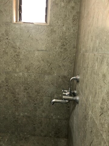 Bathroom in 1 BHK Apartment at Goyal Footprints, Thanisandra Main Road – for Rent