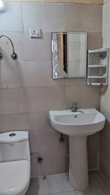 Bathroom in 2 BHK Apartment at Mittal Rajnagar Residency, Raj Nagar Extension – for Rent