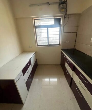 Kitchen in 2 BHK Apartment at Siddhivinayak Vastu, Chinchpokli – for Rent
