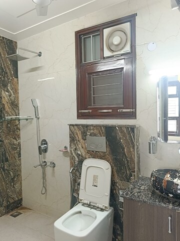 Bathroom in 4 BHK Builder Floor at Sector 51 – for Rent