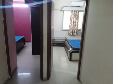 Room in 2 BHK Apartment at Adani Pratham, Near Nirma University On Sg Highway – for Rent