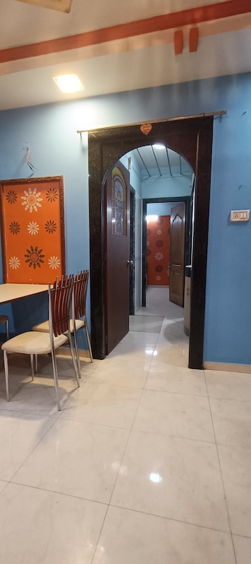 Living Room in 1 BHK Apartment at Porwal Tower, Mira Road – for Rent