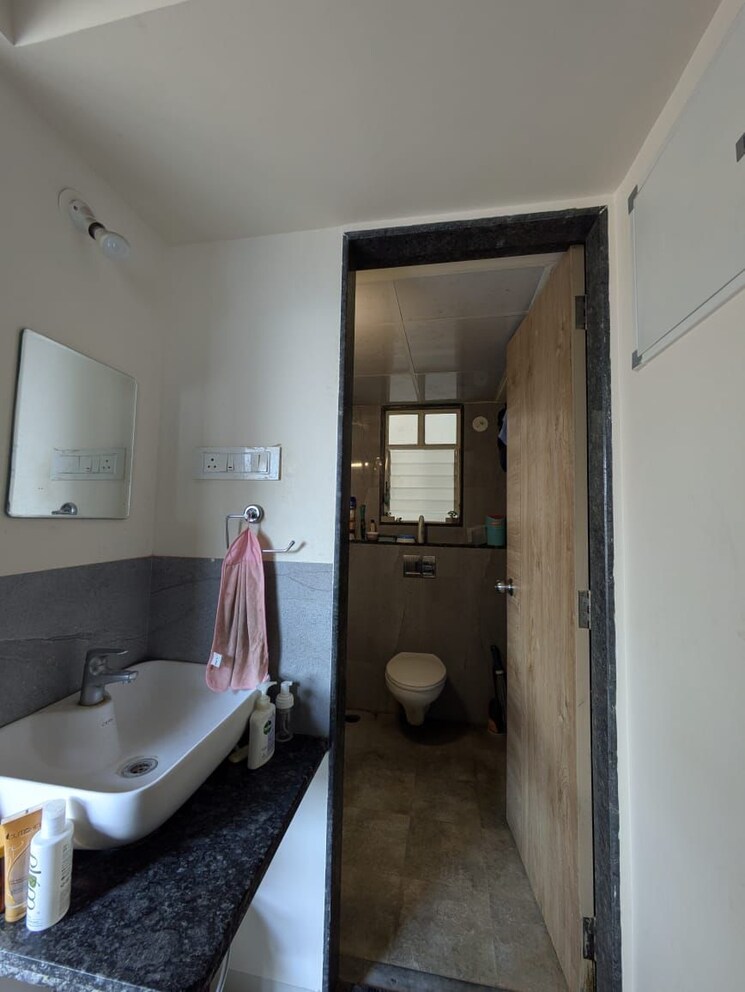 Bathroom, abhinav-pebbles-urbania 2 Bedroom 740 Sq.Ft. Apartment In Bavdhan Pune 8013396