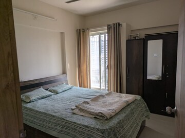 Bedroom in 2 BHK Apartment at Abhinav Pebbles Urbania, Bavdhan – for Rent