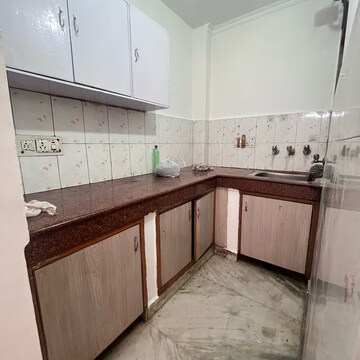 Kitchen in 2 BHK Builder Floor at Khirki Extension – for Rent