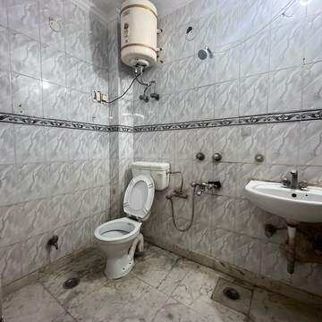 Bathroom in 2 BHK Builder Floor at Khirki Extension – for Rent