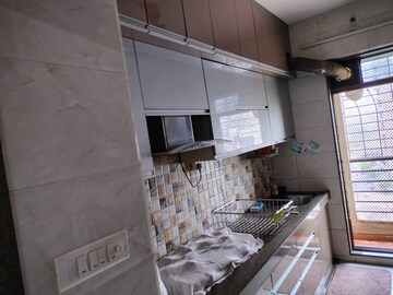 Kitchen in 2 BHK Apartment at Juhi Niharika Residency, Kharghar – for Sale