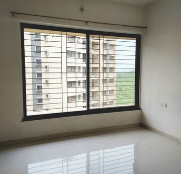 Room in 2 BHK Apartment at Pride World City Long Island, Charholi Budruk – for Sale