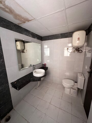 Bathroom in 3 BHK Apartment at BPTP Amstoria, Sector 102 – for Rent