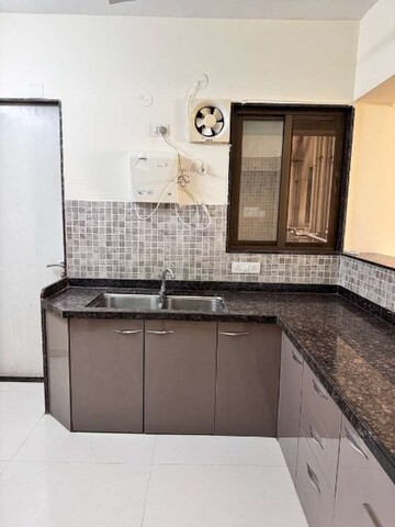 Kitchen in 2 BHK Apartment at Kool Homes Arena, Balewadi – for Rent