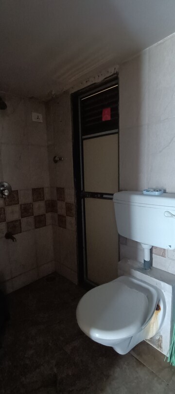 Bathroom in 1 BHK Apartment at Sadguru Paradise, Mira Road – for Rent