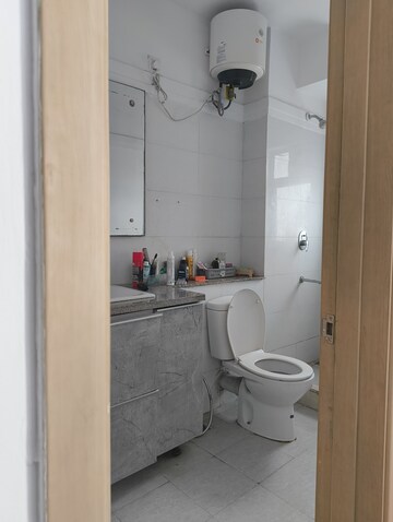 Bathroom in 2 BHK Apartment at Vatika INXT High Street, Sector 83 – for Sale