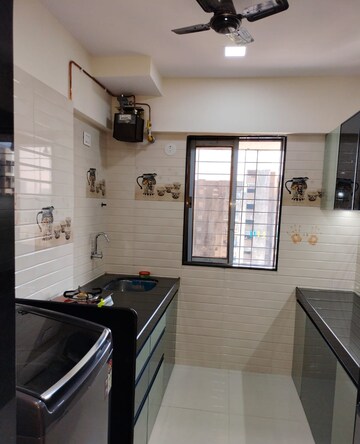 Kitchen in 1 BHK Apartment at Victoria Building, Kandivali West – for Rent