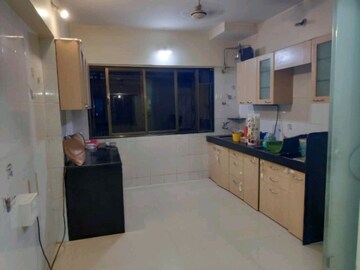 Kitchen in 2 BHK Apartment at Aniruddha CHS, Tilak Nagar – for Rent